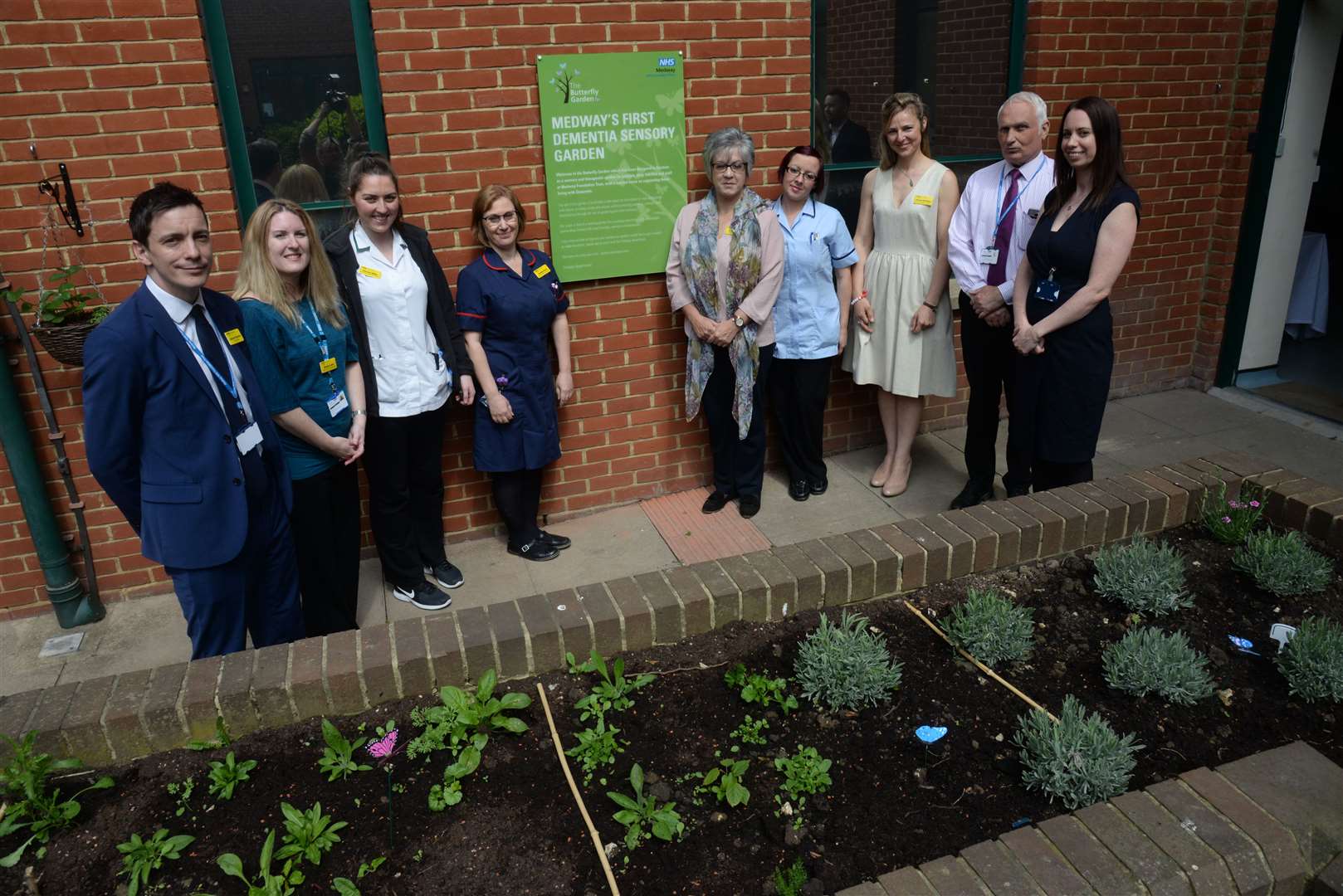 Chief Executive James DeVine and the working group at the opening of the dementia garden at the Medway Maritime Hospital on Wednesday. Picture: Chris Davey. (9488570)