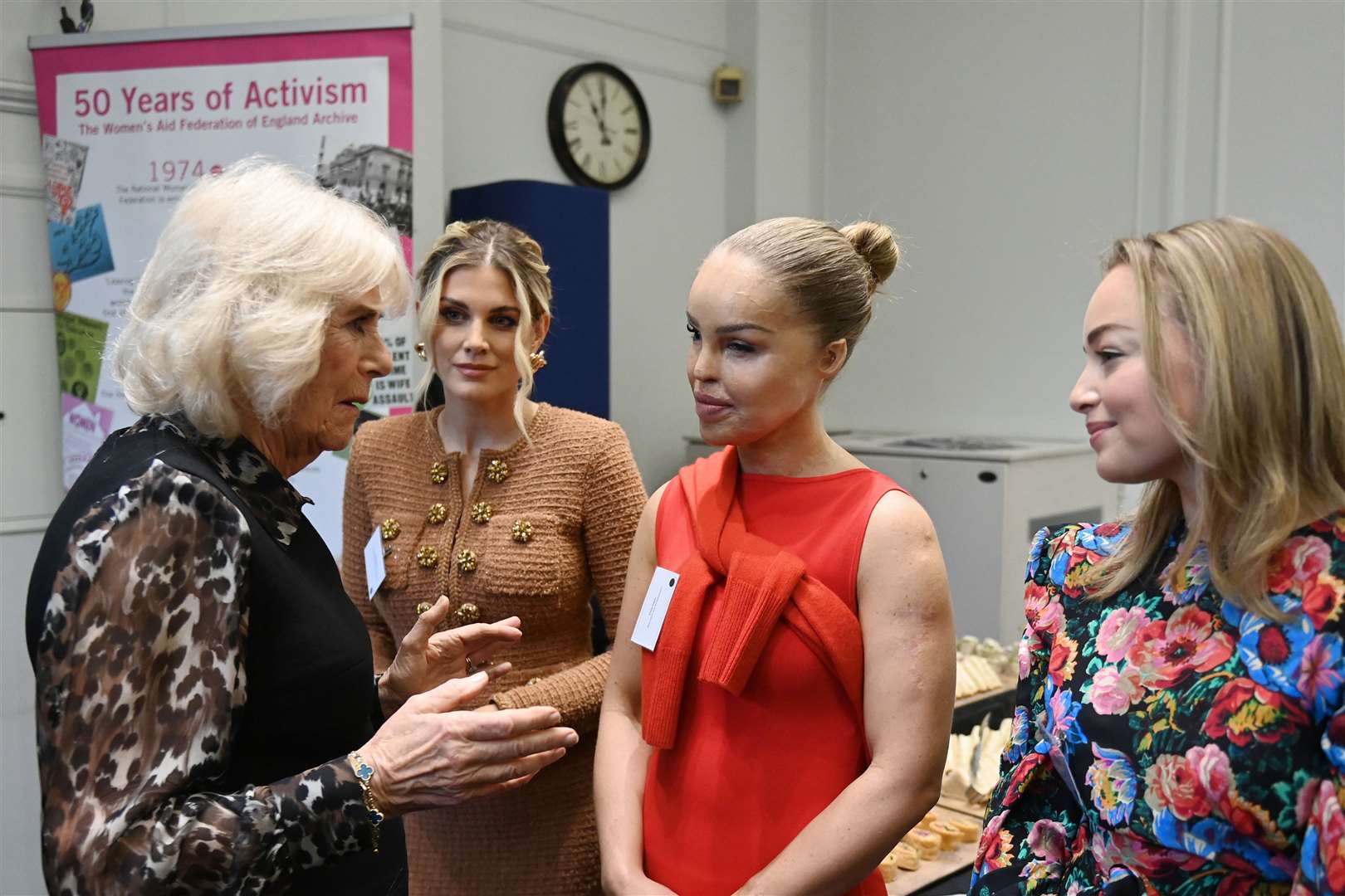 Camilla speaks to (left to right) Ashley James, Katie Piper and Alice Liveing (Stuart C Wilson/PA)