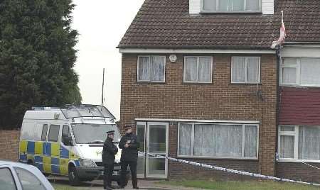 Police at the scene of the double tragedy last month. Picture: MATT READING
