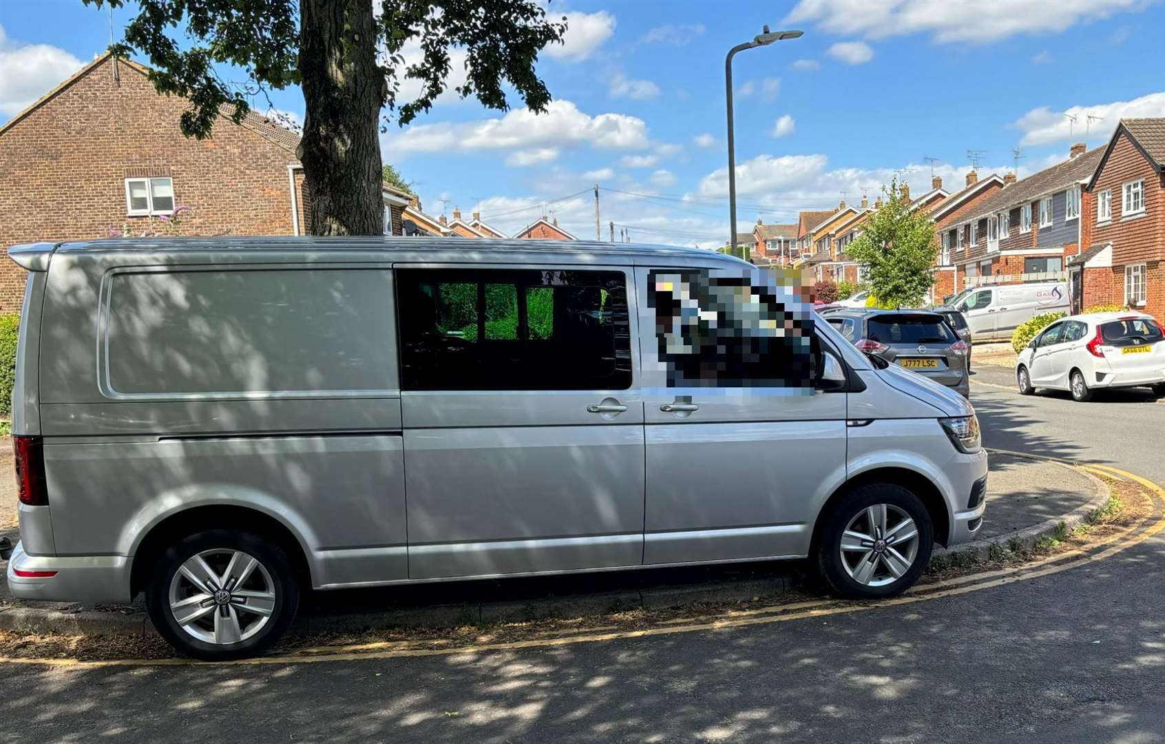 A van parked on double-yellow lines in Highfield Road, Willesborough, where residents are growing increasingly frustrated about thoughtless parking