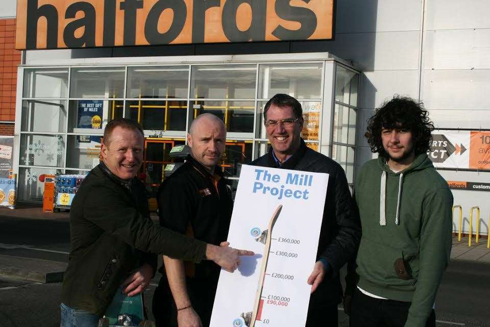 Dave Green, mentor of The Mill project, Steve Wietetha, deputy manager of Halfords, Cllr Mike Whiting and Jordan Rogers, chairman