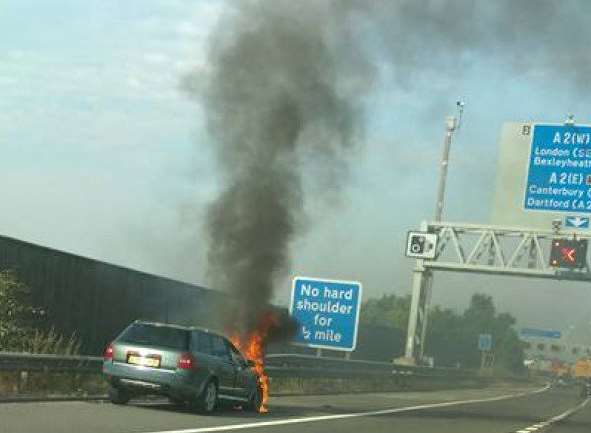 The burning car. Picture: Eliburt Punzalan