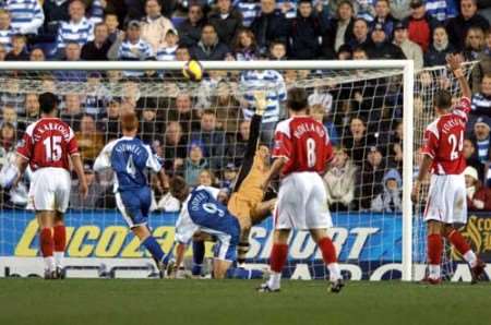 Kevin Doyle lobs Scott Carson for Reading's second goal. Picture: MATT WALKER