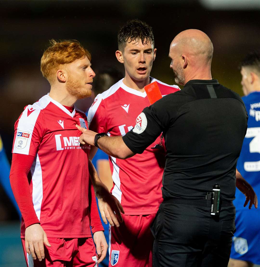 Referee Kevin Johnson pulls out the red card after being confronted by Ben Pringle Picture: Ady Kerry