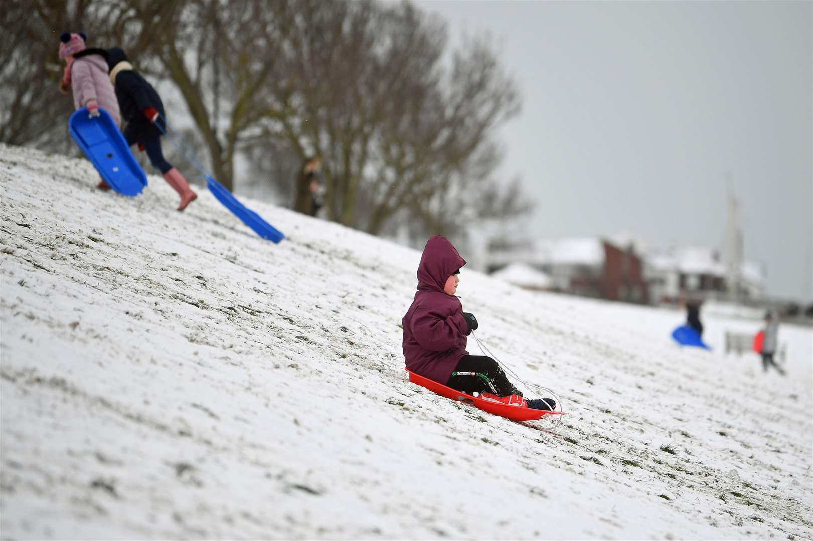 Young and old were enjoying the snow in Essex (Victoria Jones/PA)