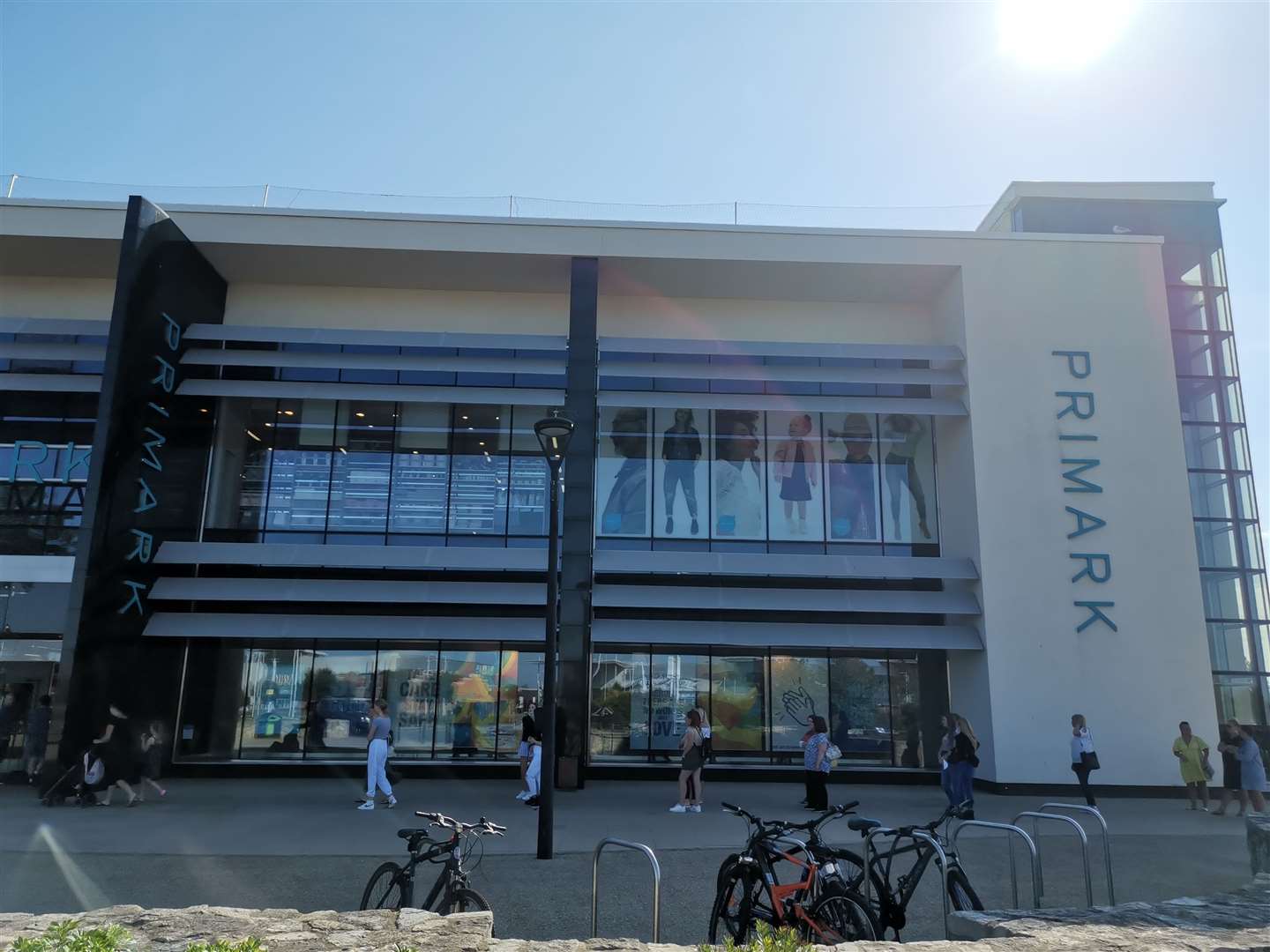 Shoppers queue outside Primark at Westwood Cross