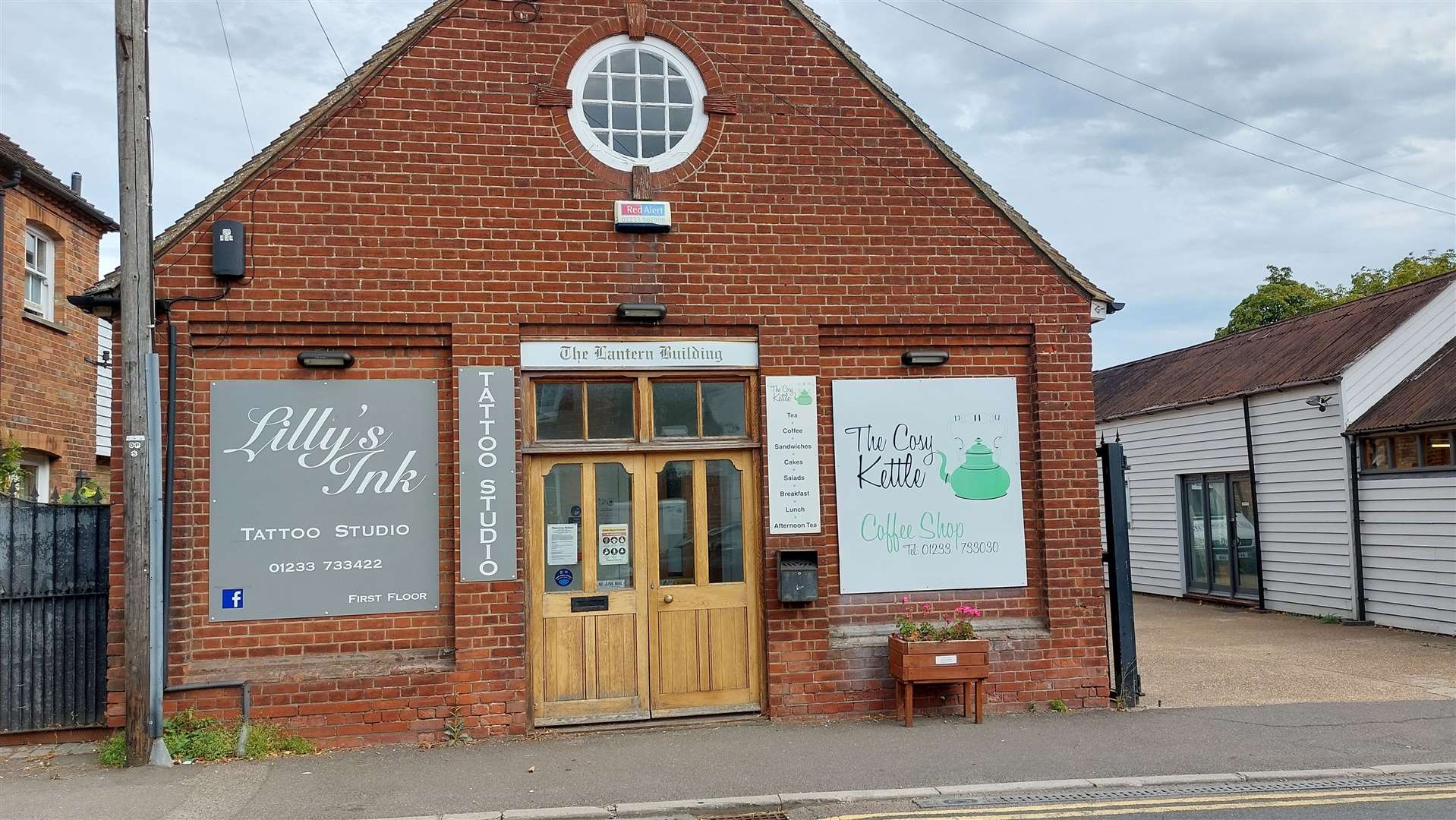 The business is next to a tattoo studio in The Street