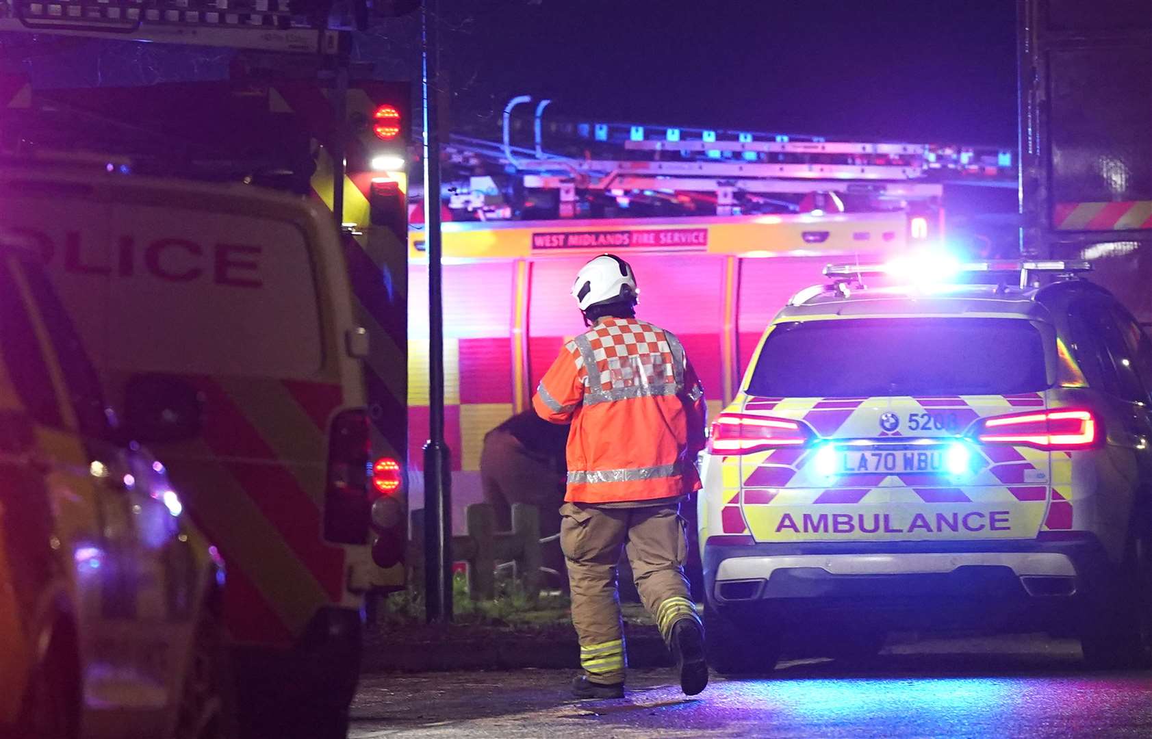 Emergency personnel at the scene in Babbs Mill Park (Jacob King/PA)