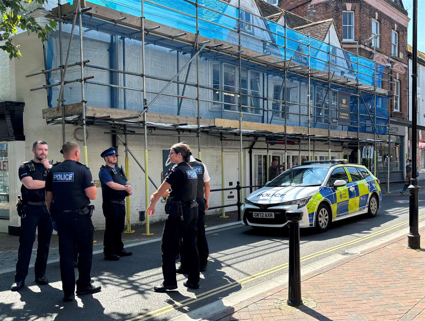 Police were spotted in Ashford High Street at the junction with North Street