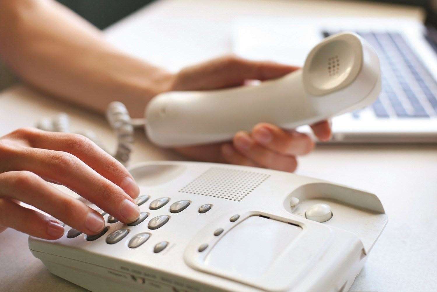 The callers put pressure on people over the phone. Stock photo