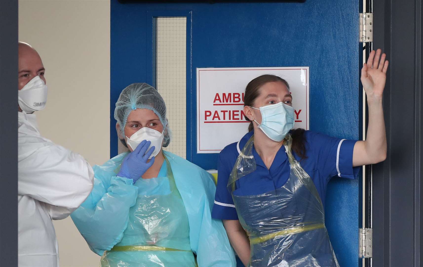 Staff cheer at Aintree University Hospital (Peter Byrne/PA)