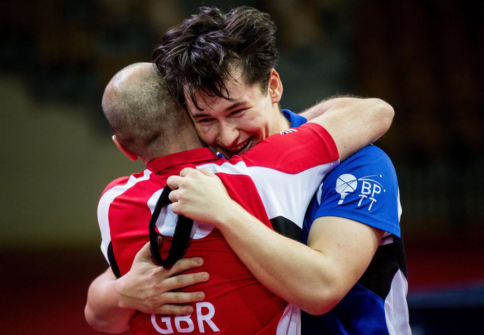 Ross Wilson celebrates with his coach at the World Championships Picture: Vid Ponikvar / Sportida