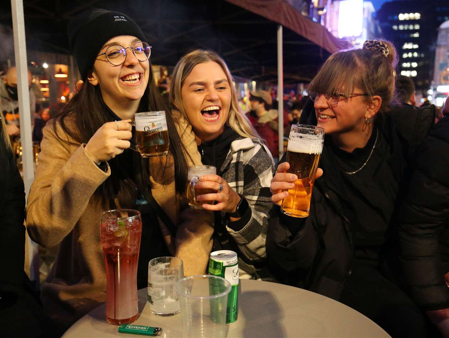 People gather for drinks and food in Old Compton Street, Soho (Jonathan Brady/PA)