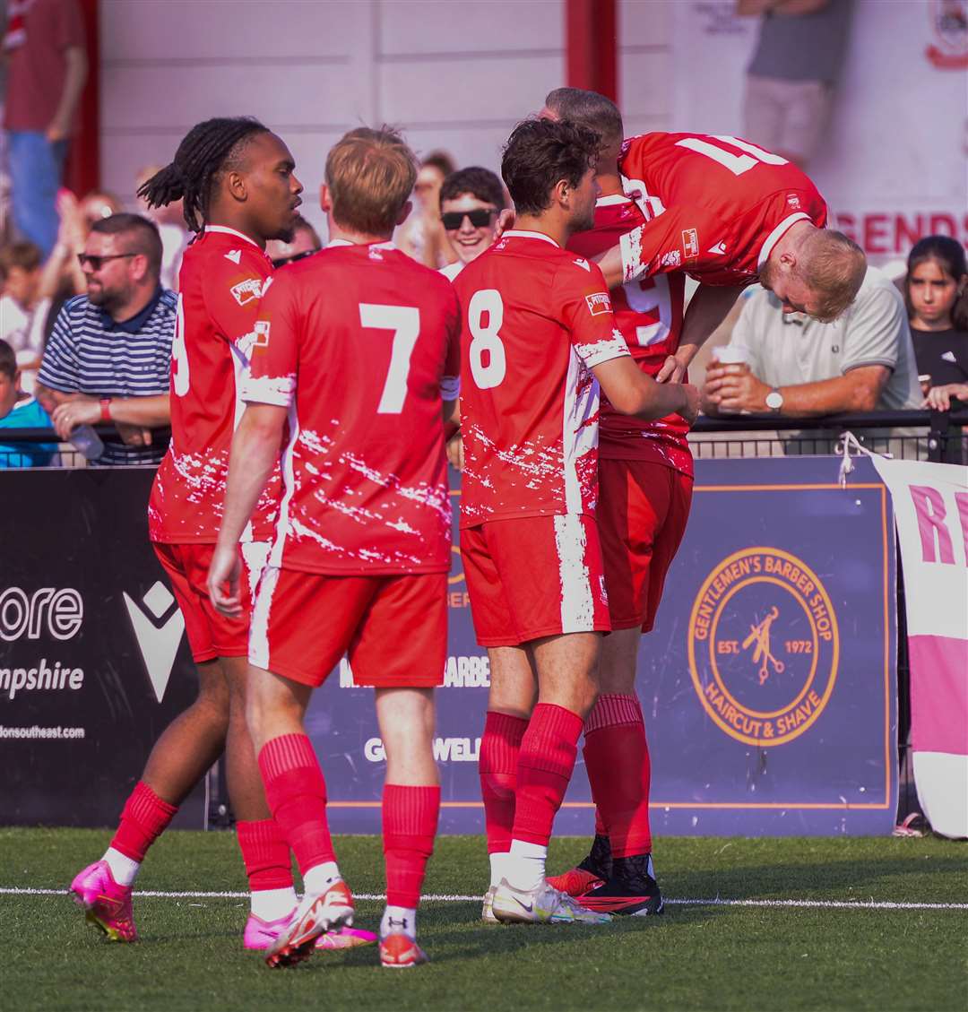 Four-goal Joe Taylor picks up Ramsgate team-mate Alfie Paxman. Picture: Stuart Watson