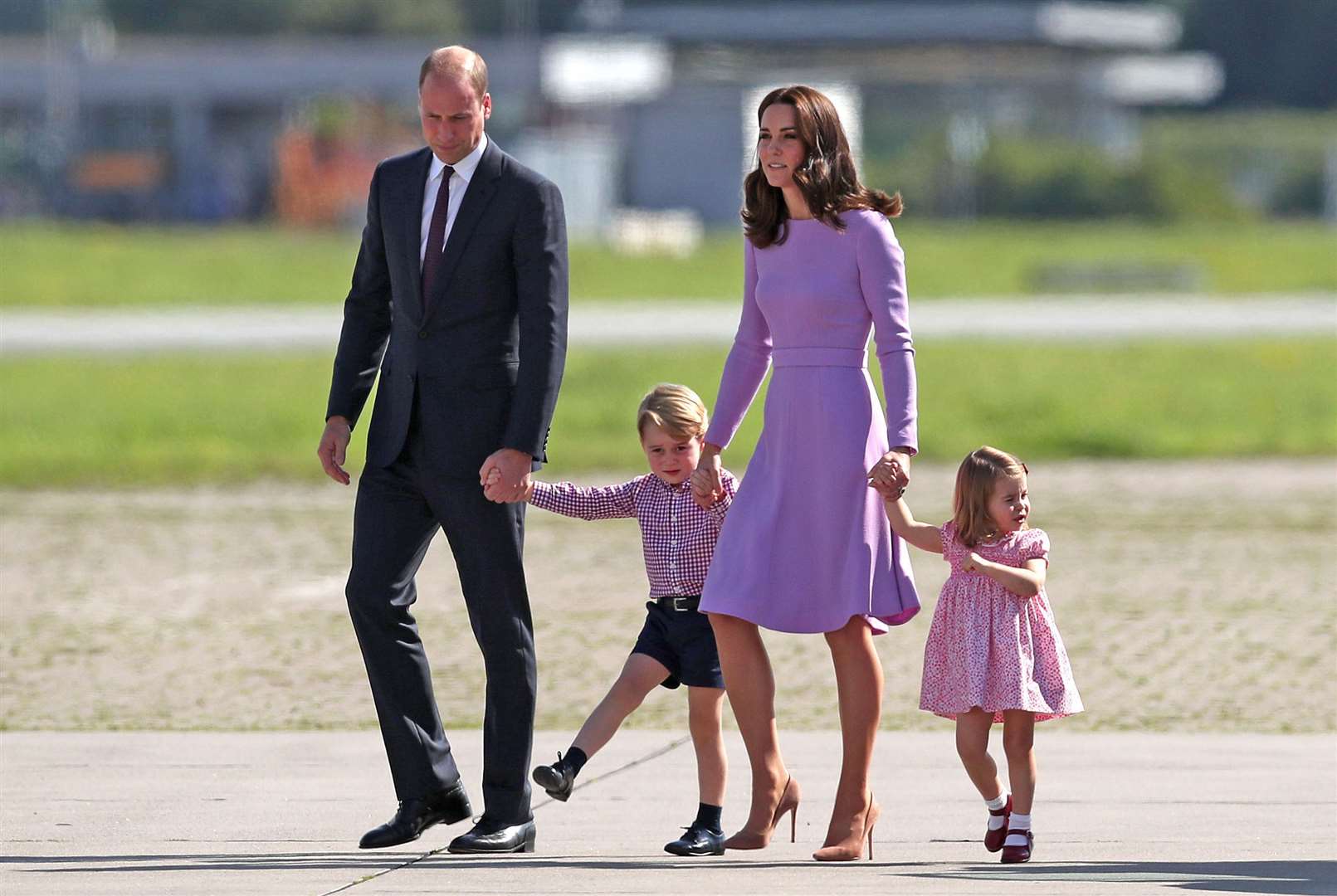 At the Airbus headquarters in Hamburg during an official visit to Germany George was trying to put his best foot forward (Jane Barlow/PA)