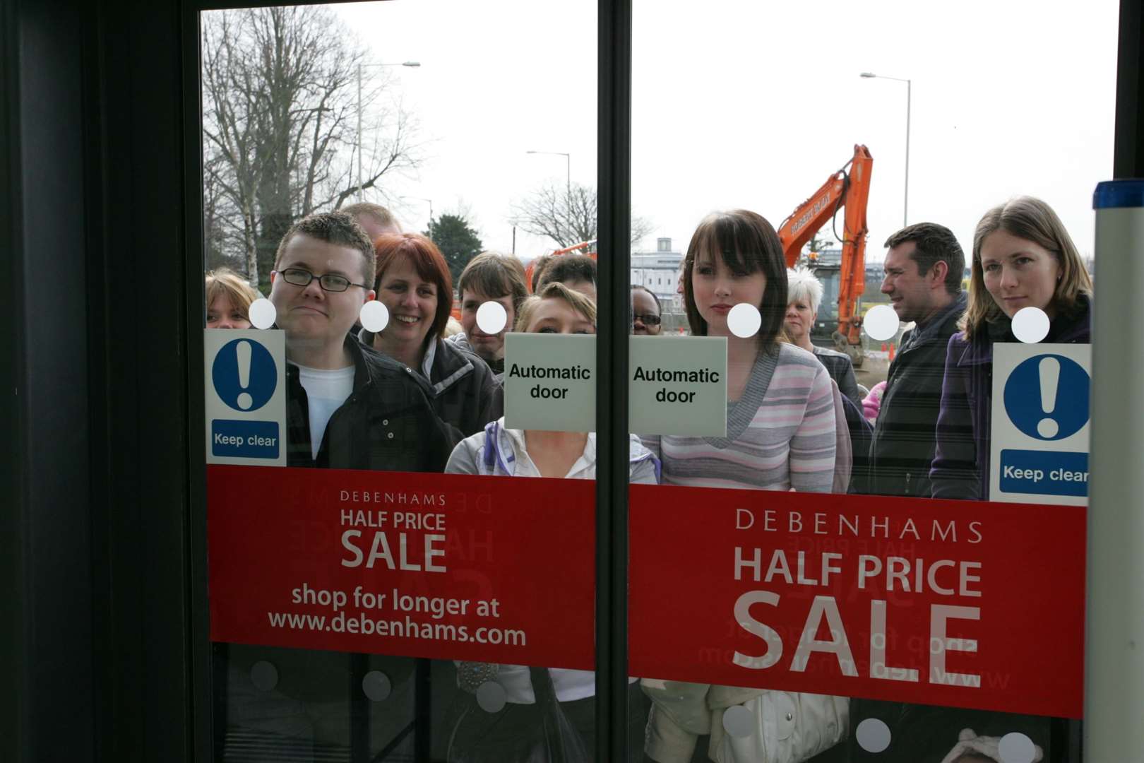 Eager shoppers waiting to enter the County Square expansion