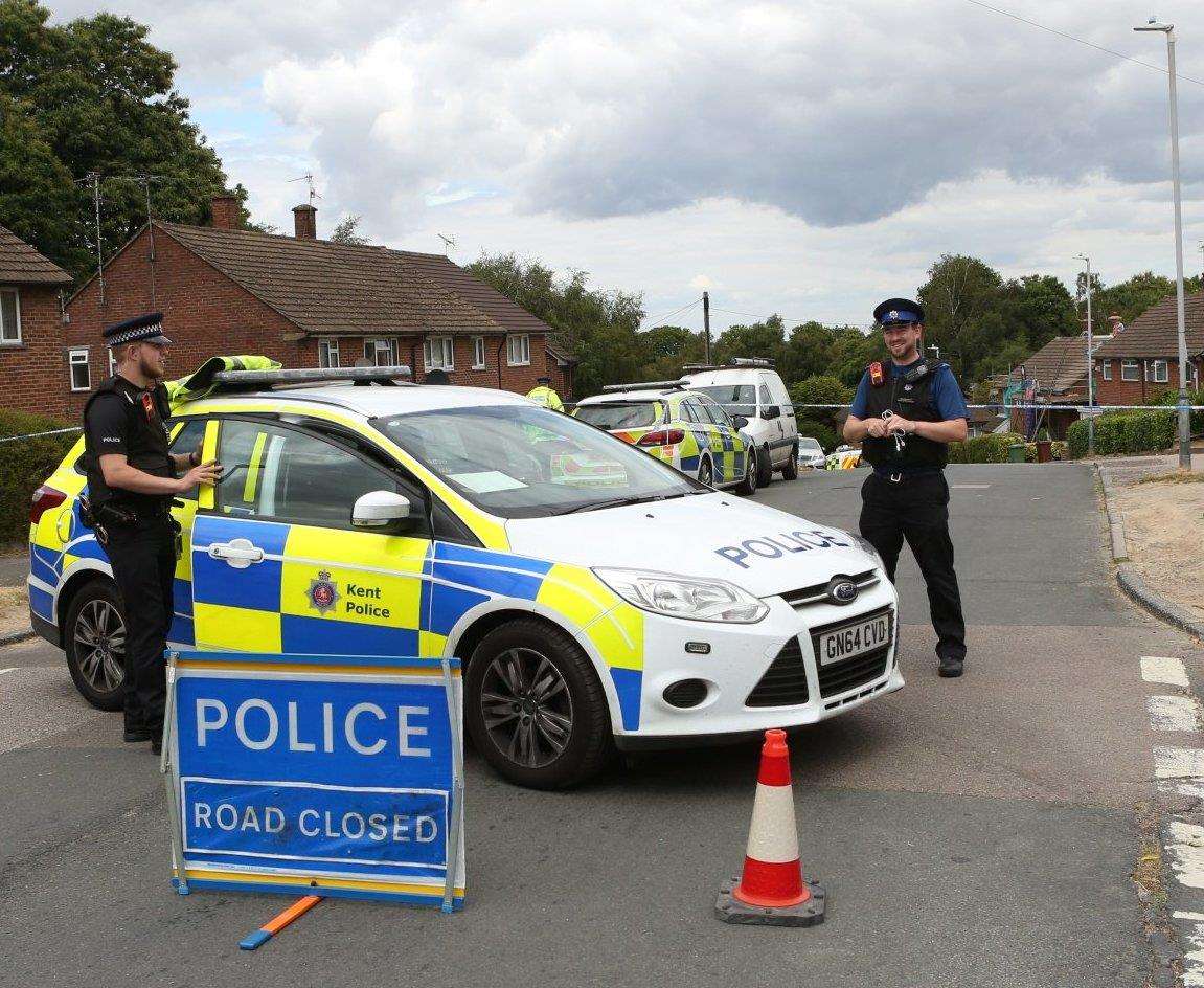 Police at the scene. Picture: UK News in Pictures