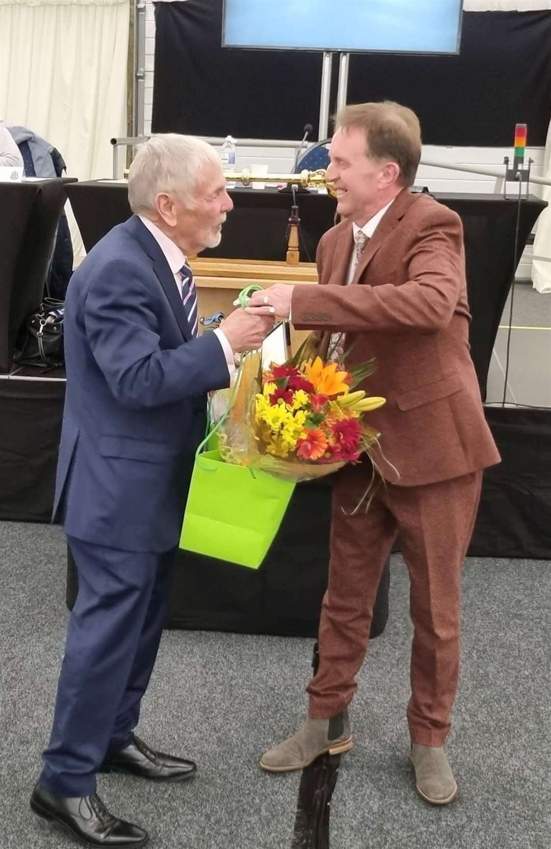 Cllr Bob Hinder accepts a certificate on behalf of his late wife Wendy Hinder from deputy mayor of Maidstone Derek Mortimer. Pic MBC