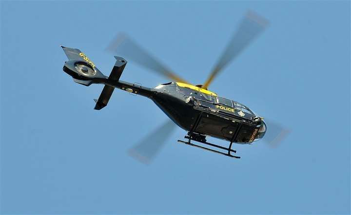 A police helicopter was seen searching the Hersden area near Canterbury last night. Stock picture