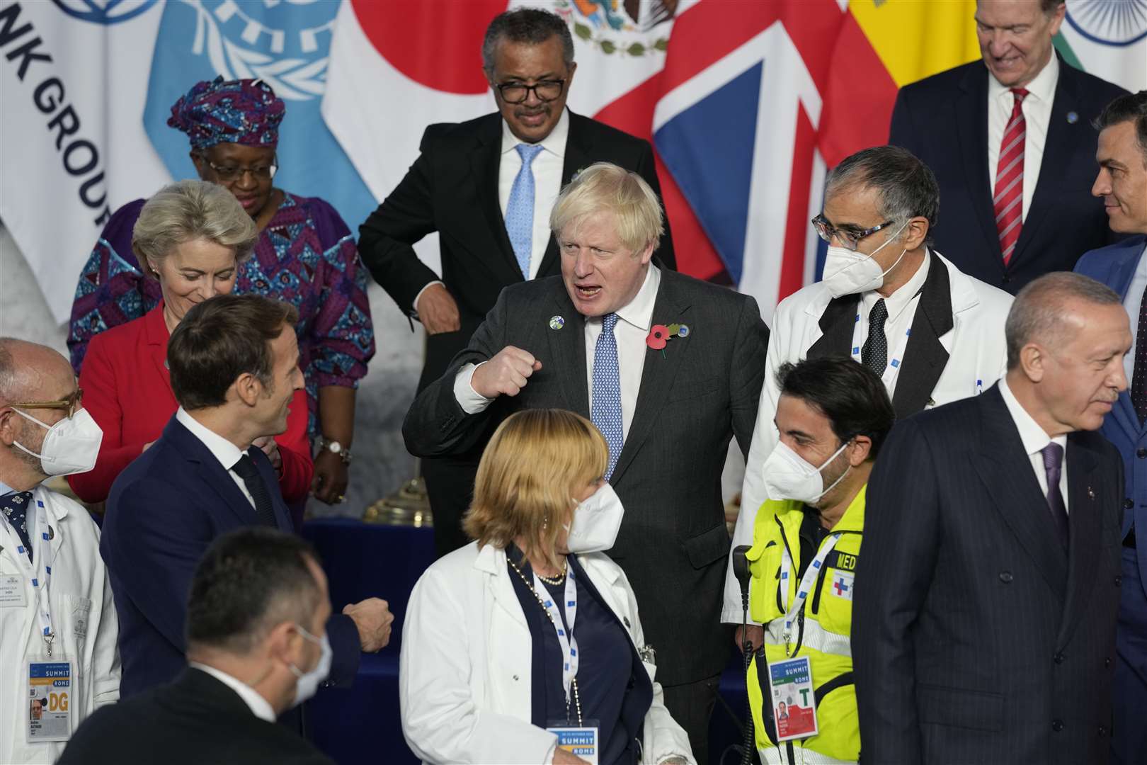 Prime Minister Boris Johnson and French President Emmanuel Macron do a fist bump during the G20 summit in Rome (Kirsty Wigglesworth/PA)