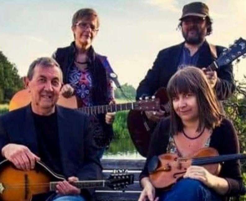 Phil (front left) and wife Marjorie (top left) performed with the Chartham String Band