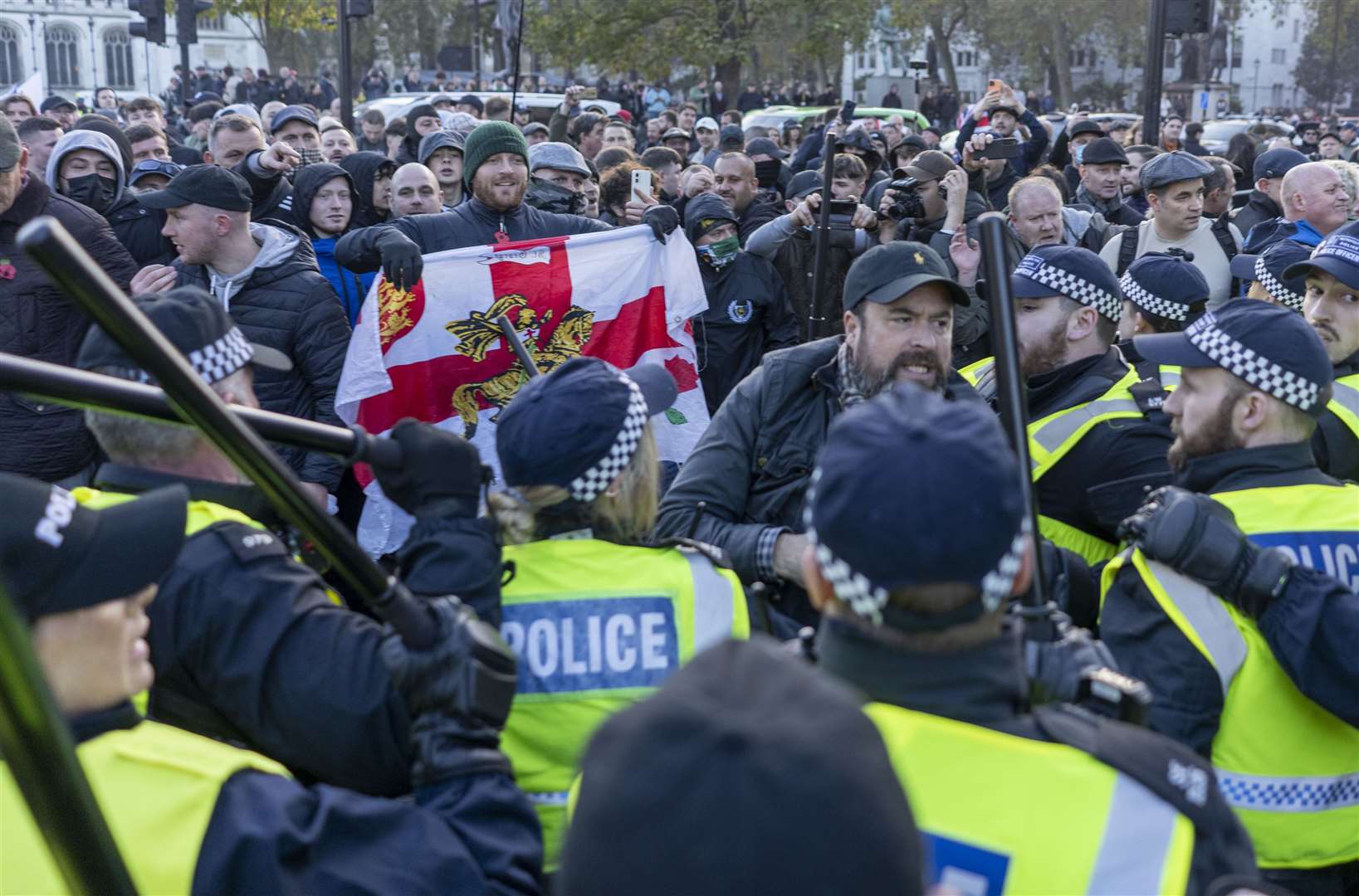 Counter-protesters clashed with police in Parliament Square on Saturday (Jeff Moore/PA)