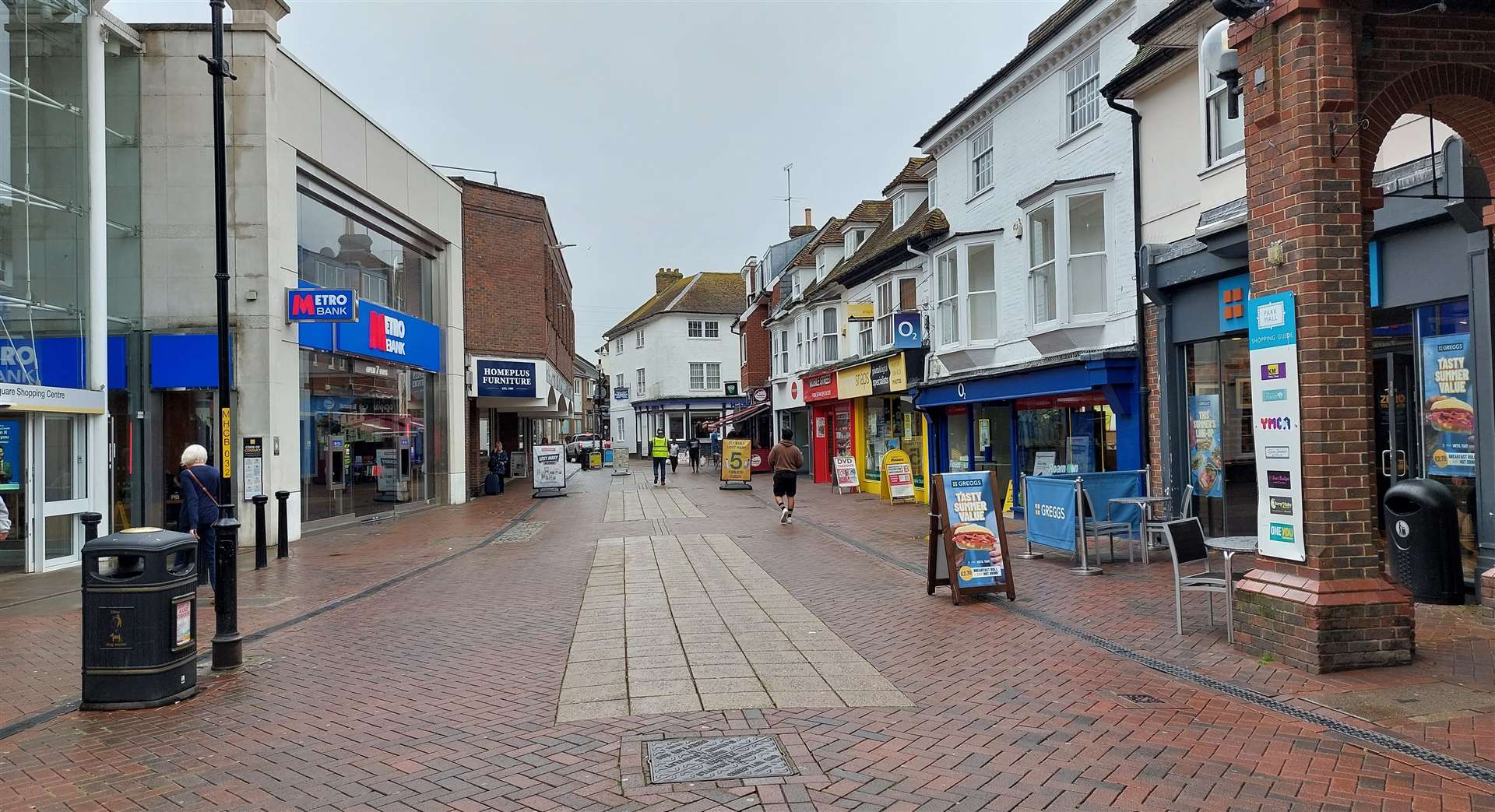 The accident happened outside Greggs in Ashford high street; the main entrance to County Square is on the left