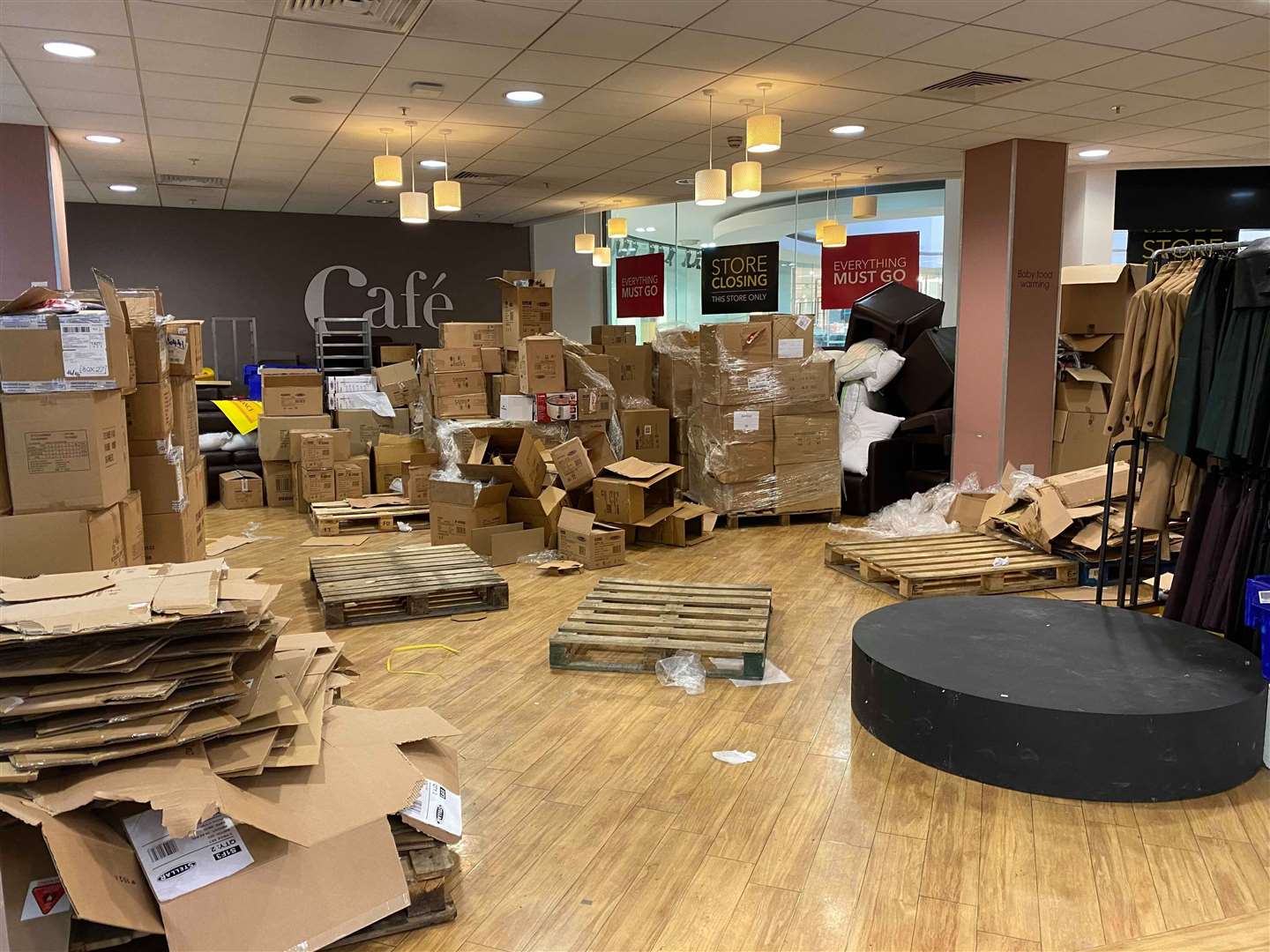 The former cafe area is being used as a storeroom at the Ashford shop