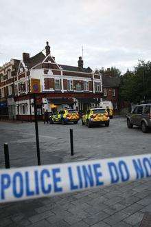 Police outside the White Lion pub in Chatham High Street