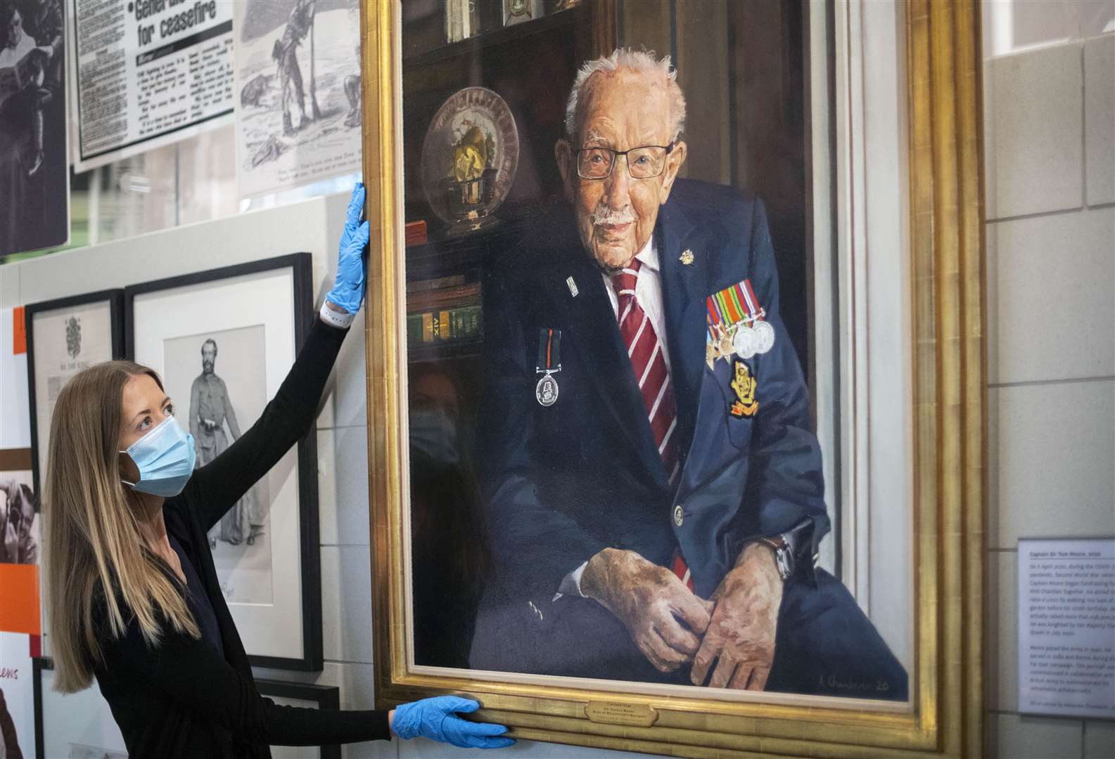 The portrait of Captain Sir Tom Moore is in the National Army Museum (Victoria Jones/PA)