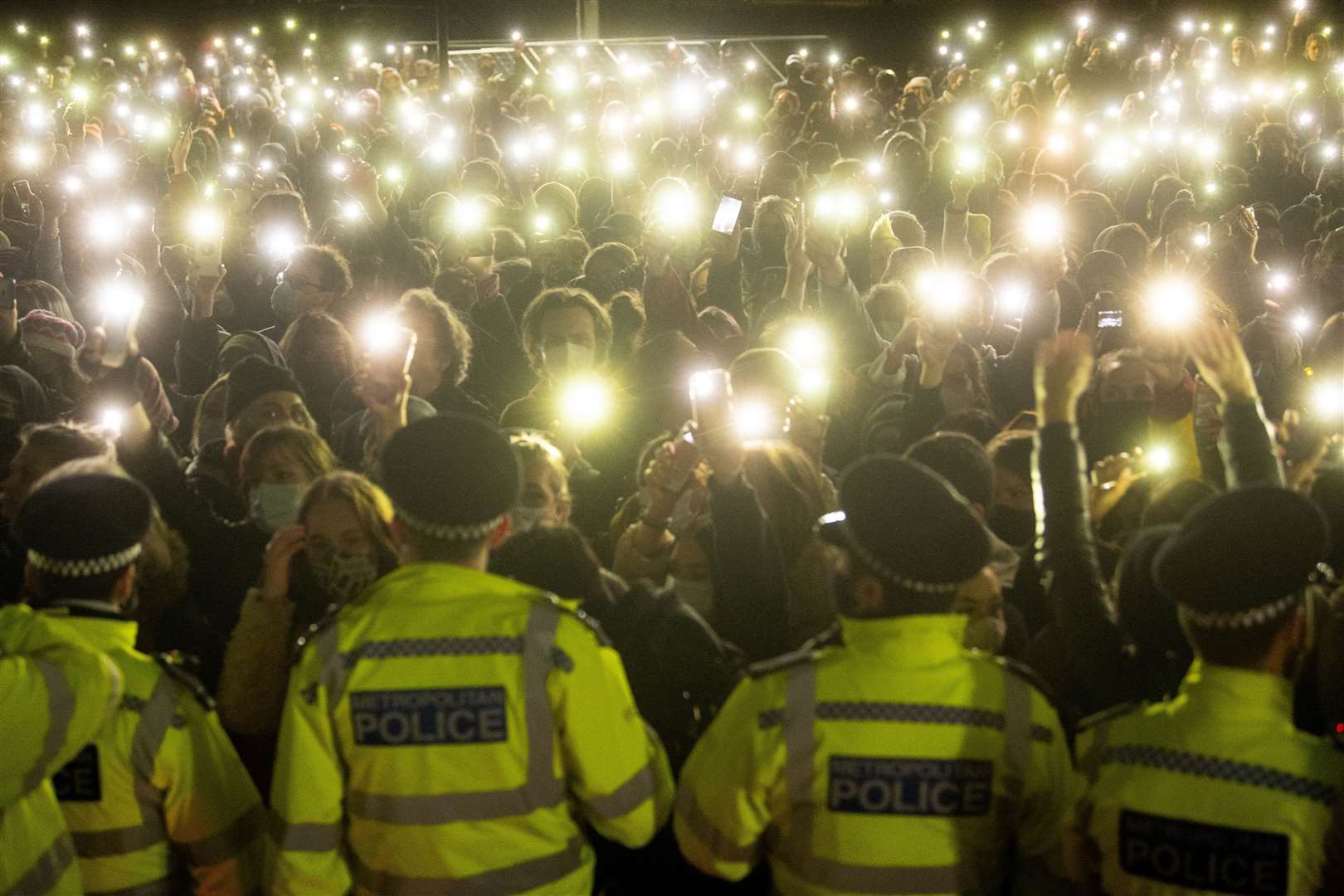 A vigil for Sarah Everard on Clapham Common, after the 33-year-old was murdered by off-duty policeman Wayne Couzens (Victoria Jones/PA)