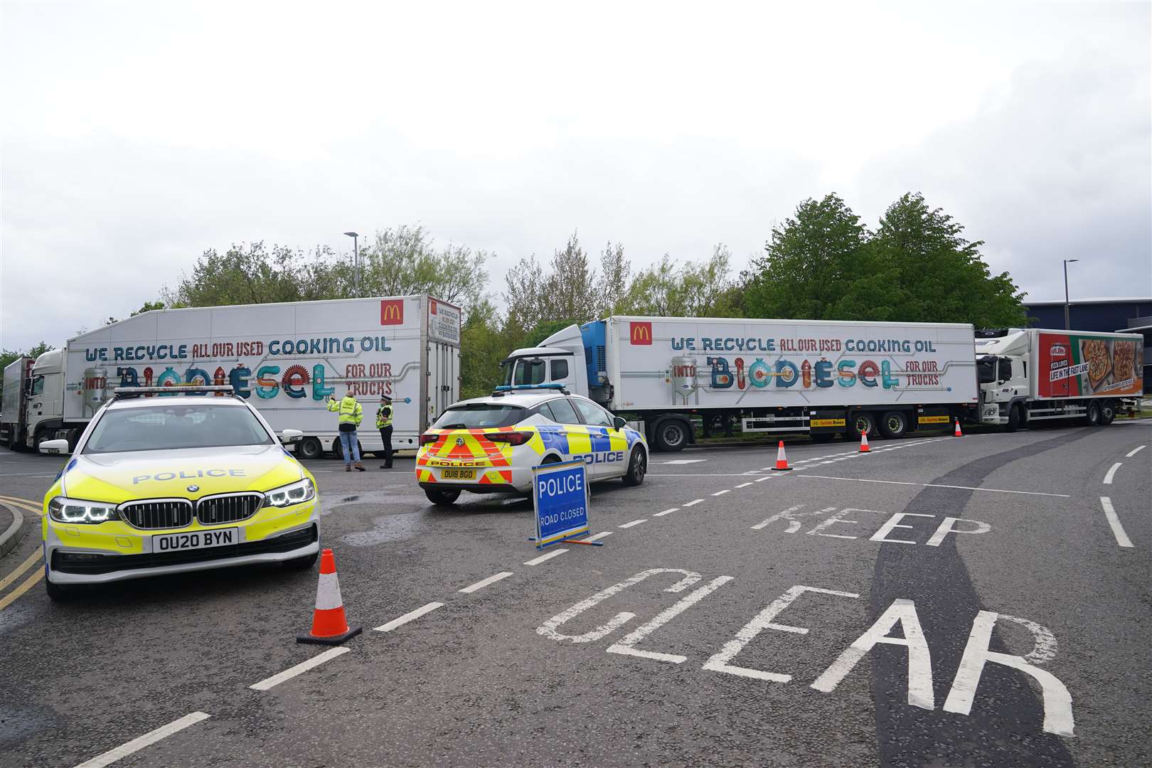 McDonald’s trucks backed up outside a distribution site in Hemel Hempstead (Yui Mok/PA)