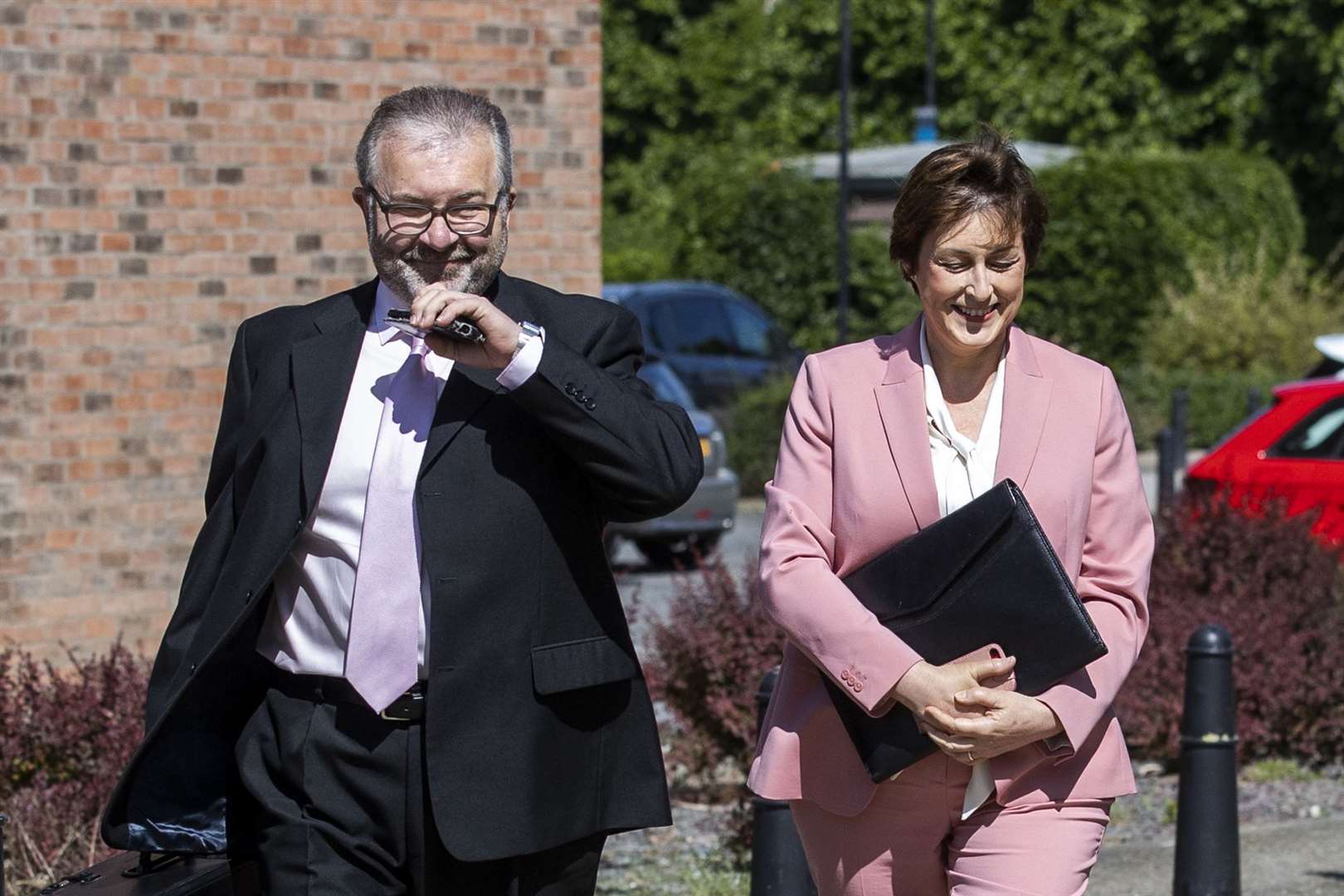 Former BBC newsreader Donna Traynor, accompanied by her husband Ronan Kelly, leaves the Office of the Industrial Tribunals, Killymeal House, Belfast (Liam McBurney/PA)