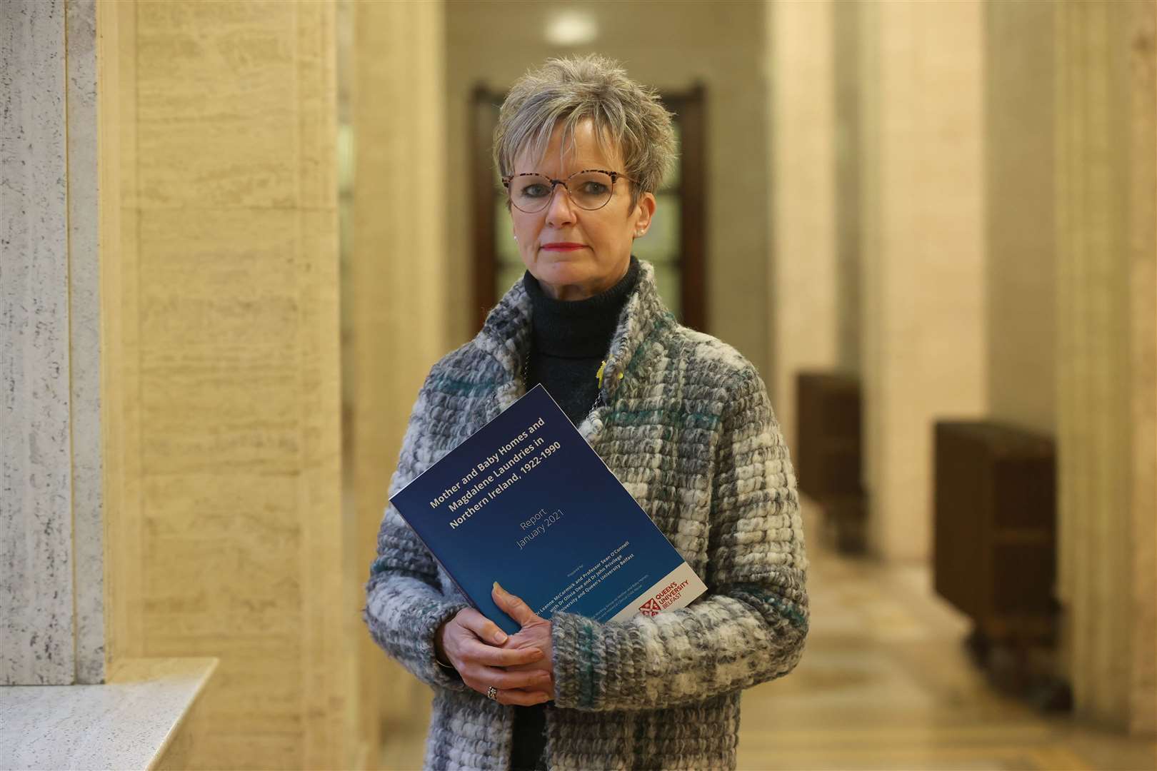 Judith Gillespie, chairwoman of the inter-departmental working group on mother and baby homes, speaking to the media at Stormont (Liam McBurney/PA)