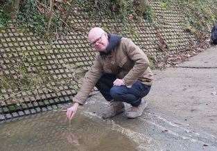 Cllr Jeffery checking on pollution levels