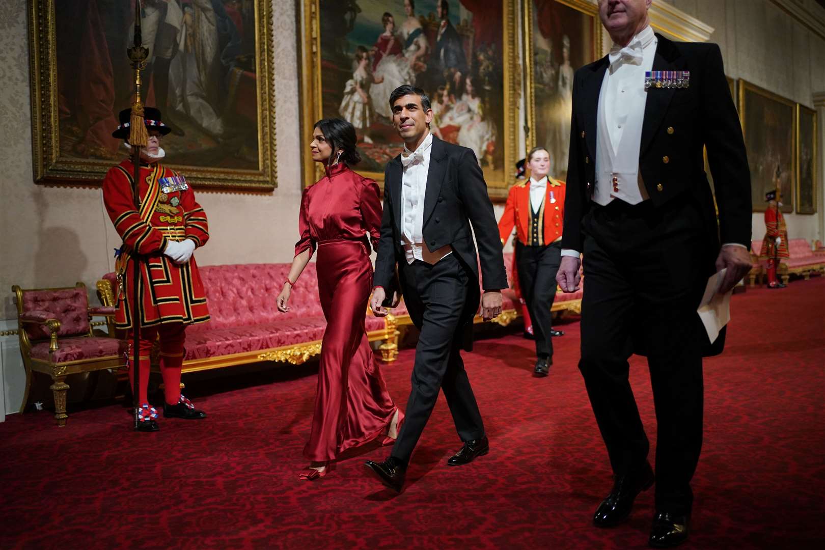 Rishi Sunak and his wife Akshata Murty arrive for the state banquet (Yui Mok/PA)