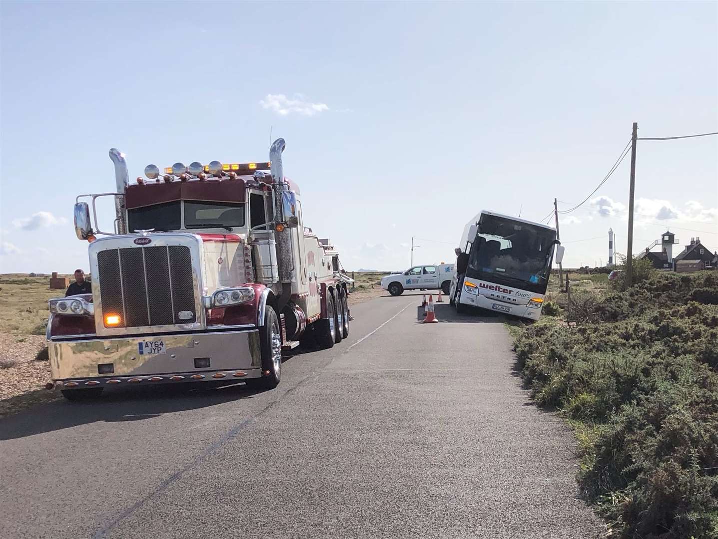 A large truck arrived to pull the bus back onto the road. Picture: Mike Bingham