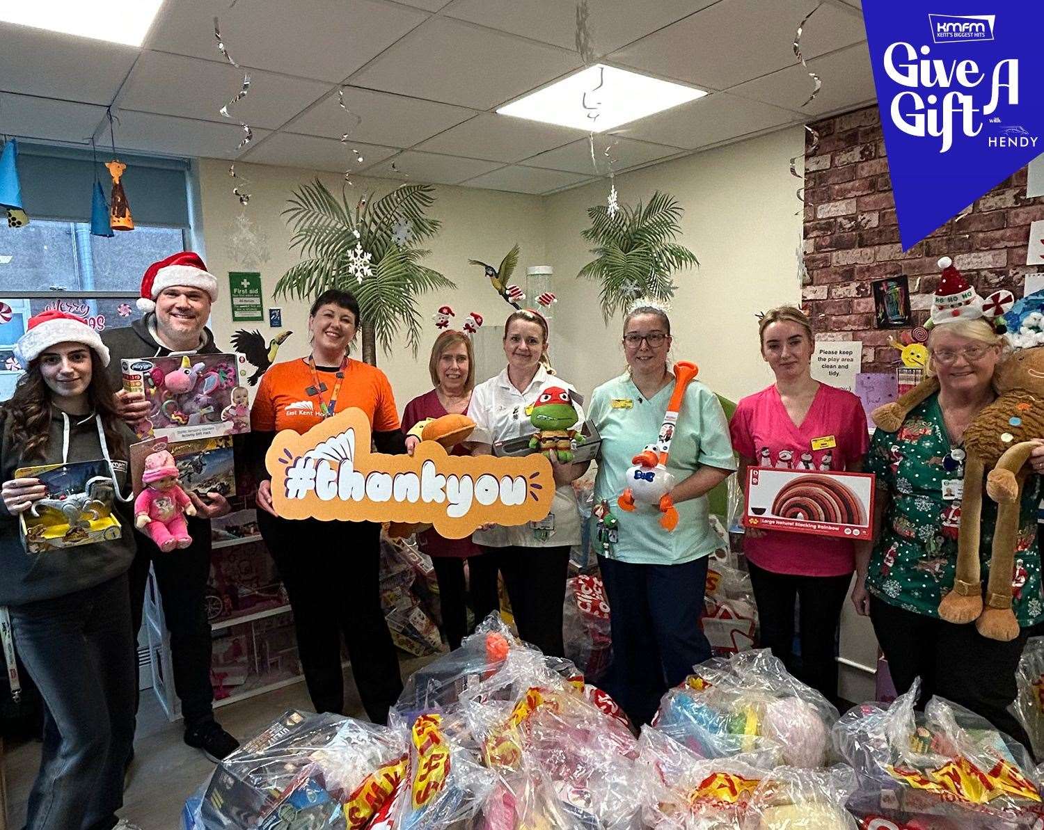 The William Harvey Hospital team receiving gifts