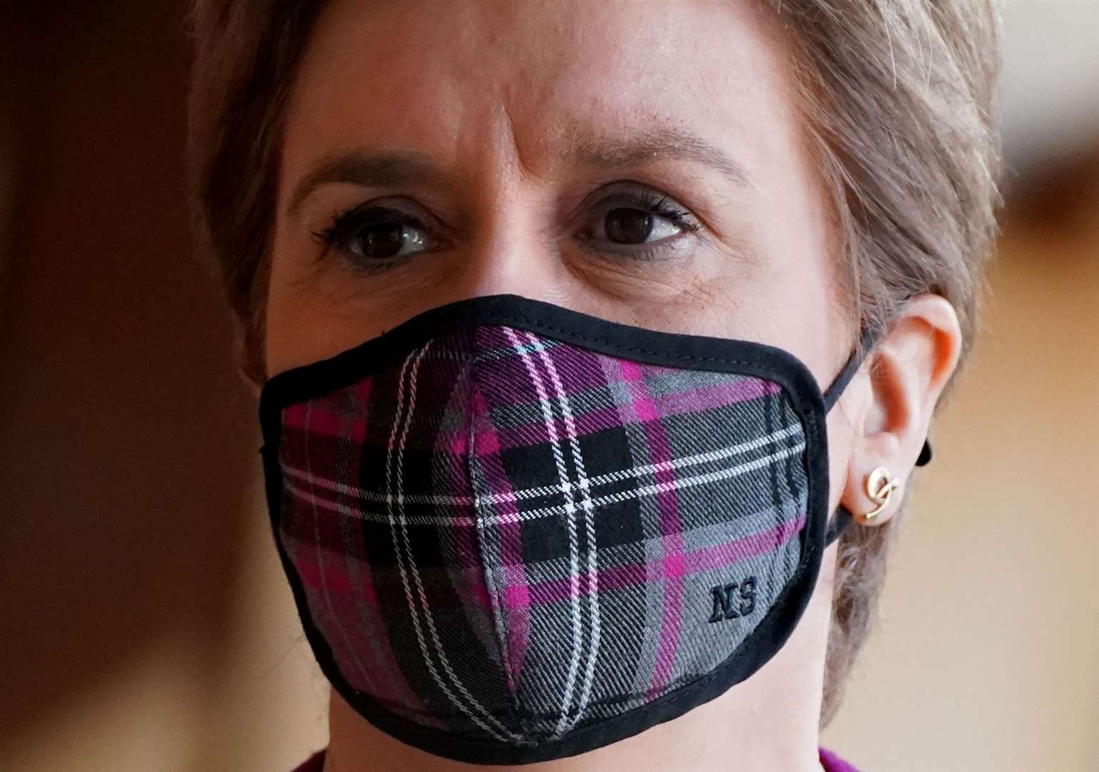 First Minister Nicola Sturgeon will announce today if face coverings will continue to be a legal requirement (Andrew Milligan/PA)