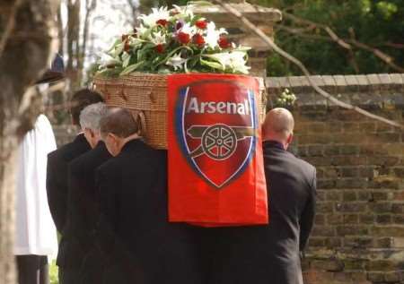 The coffin was draped in the flag of his favourite soccer team. Picture: BARRY CRAYFORD