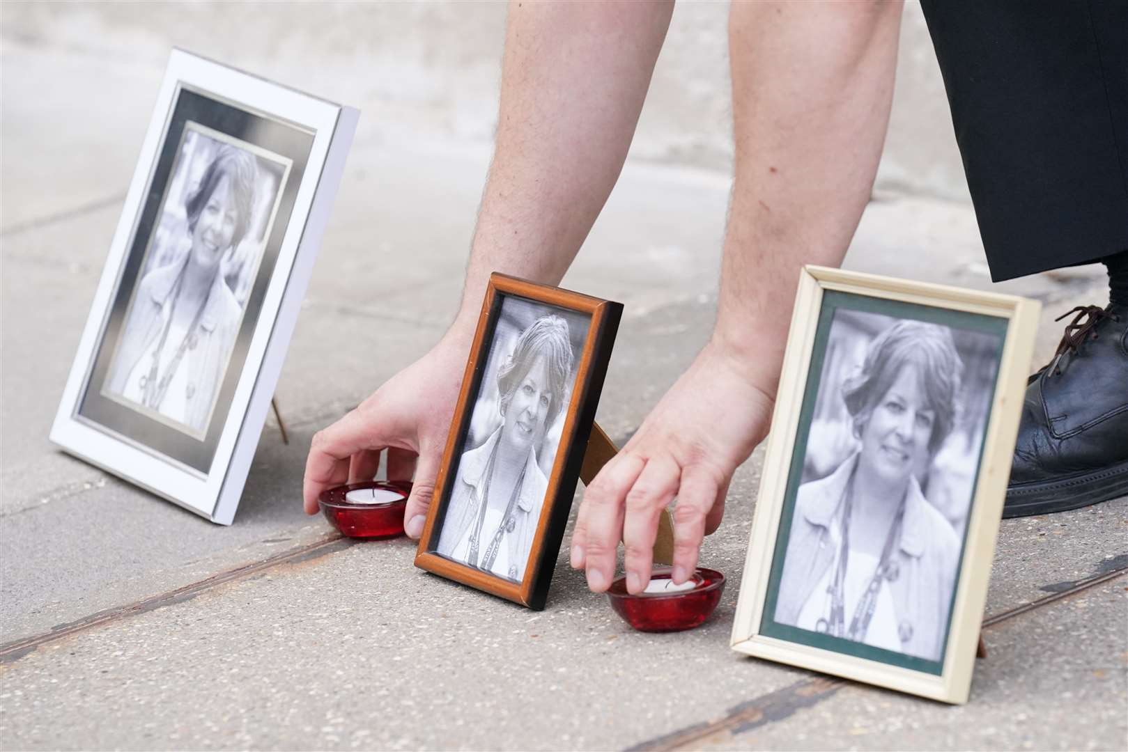 People attend a vigil for Ruth Perry outside the offices of Ofsted (Jonathan Brady/File/PA)