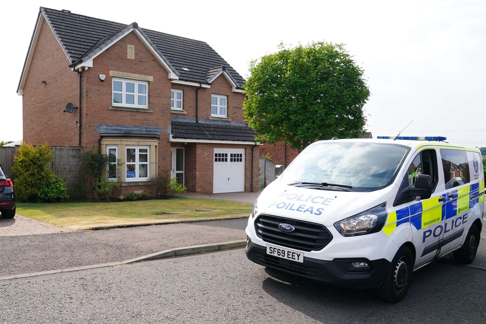 A police van outside Ms Sturgeon’s home in Uddingtson, Glasgow (Jane Barlow/PA)