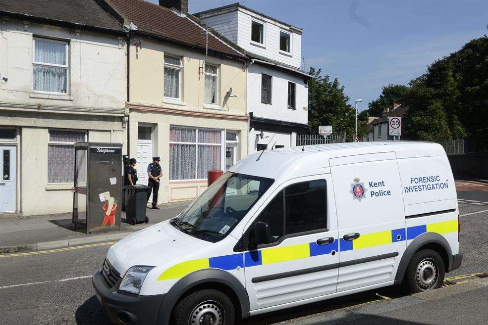 Police and Forensic officers outside the flat in East Street, Tower Hamlets, Dover