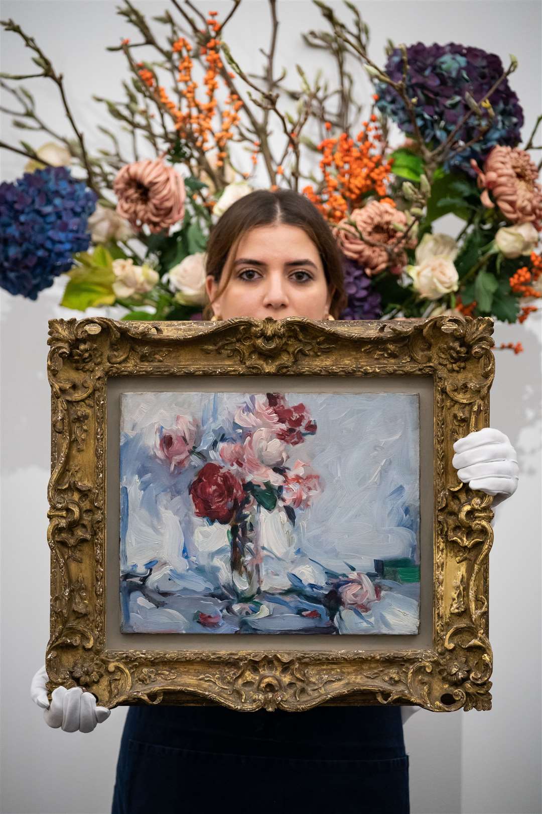 Still Life of Pink and Red Roses in a Vase by Samuel John Peploe (Aaron Chown/PA)