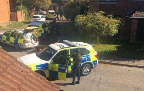 Armed police seen in Harvesters Way