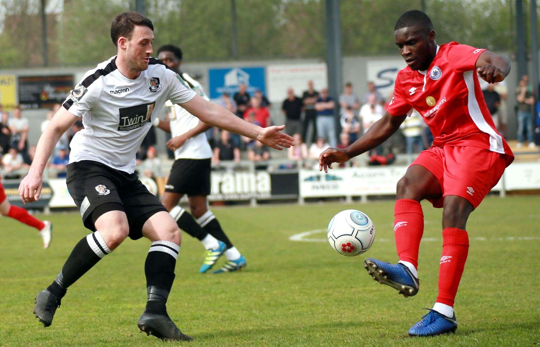 Dartford's Callum Driver closes down Moses Emmanuel. Picture: Phil Lee