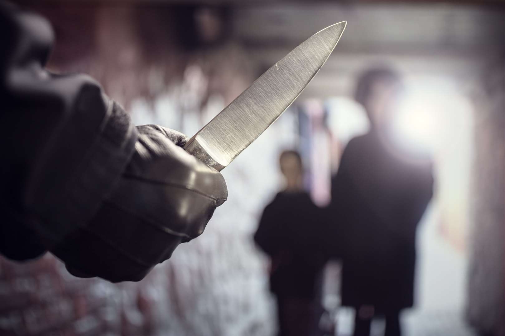 The teenager was threatened with a knife by a group of people