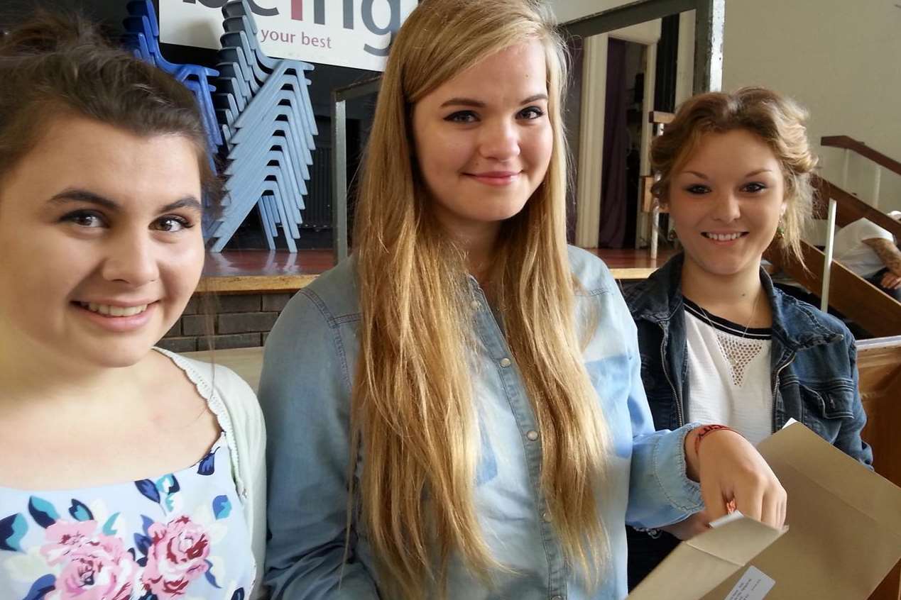 Pupils at High Weald Academy in Cranbrook open their results. From left, Emily Lineham from Lenham, Lauren Andrews from Staplehurst and Annie Shand from Hawkhurst, all 16.