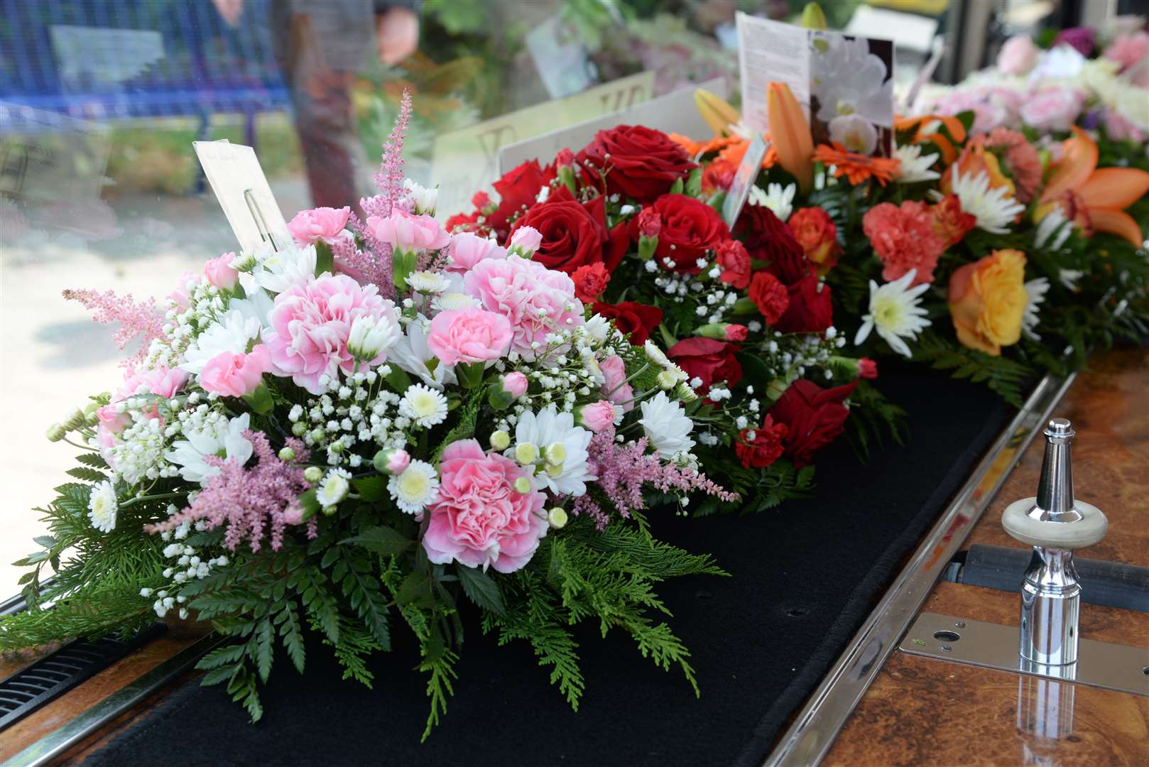 Floral tributes at the funeral of Kim Sampson at St Alphege Church, Whitstable