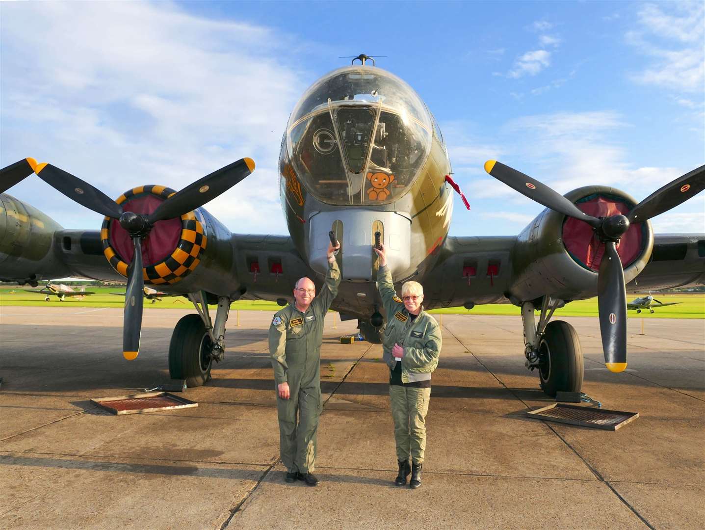 Elly Sallingboe with Captain Peter Kuypers and the Sally B B-17 Flying Fortress. Image submitted by Elly Sallingboe